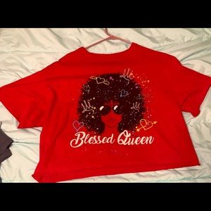 Words blessed queen with women with an Afro and sunglasses on it.